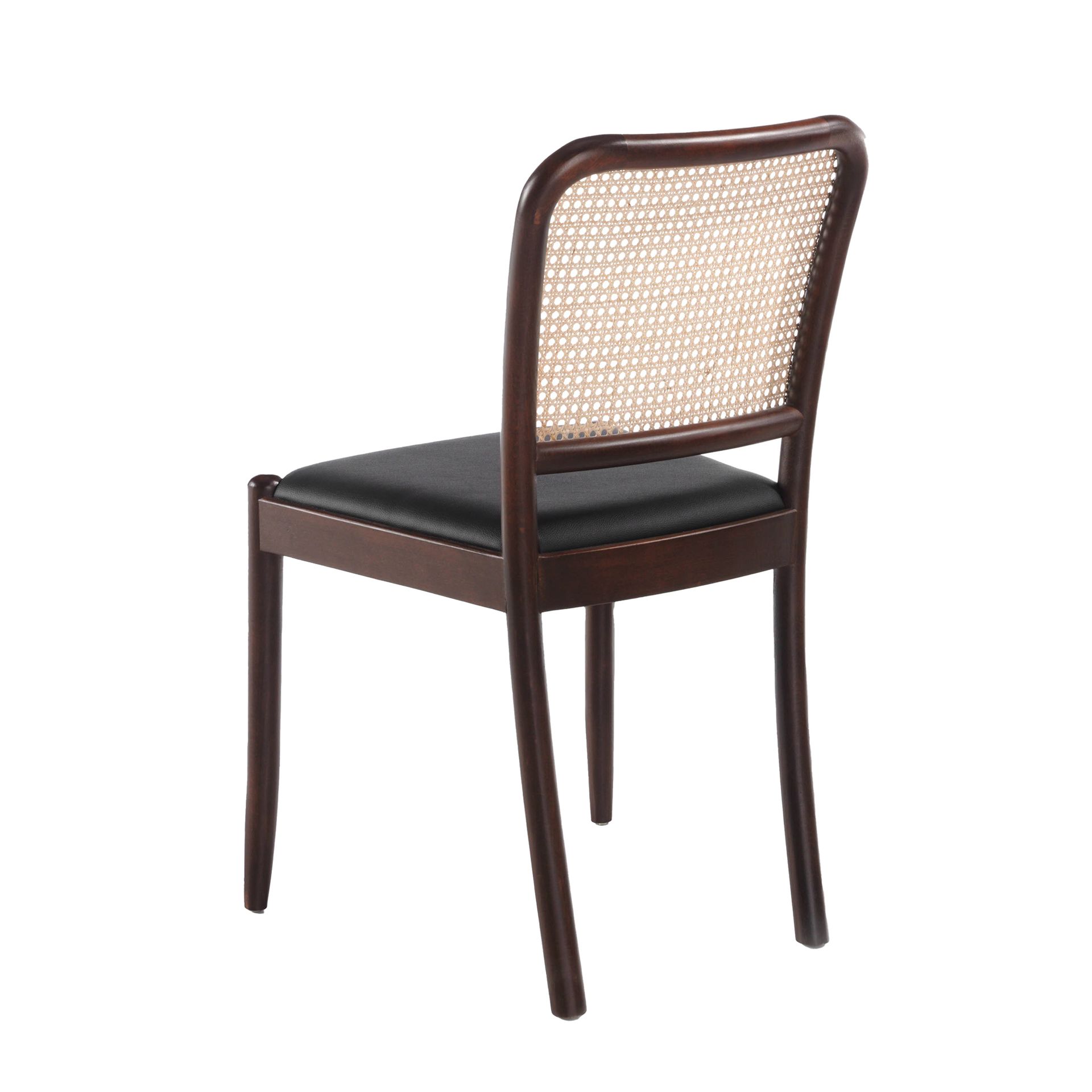 Rattan and black leatherette chair