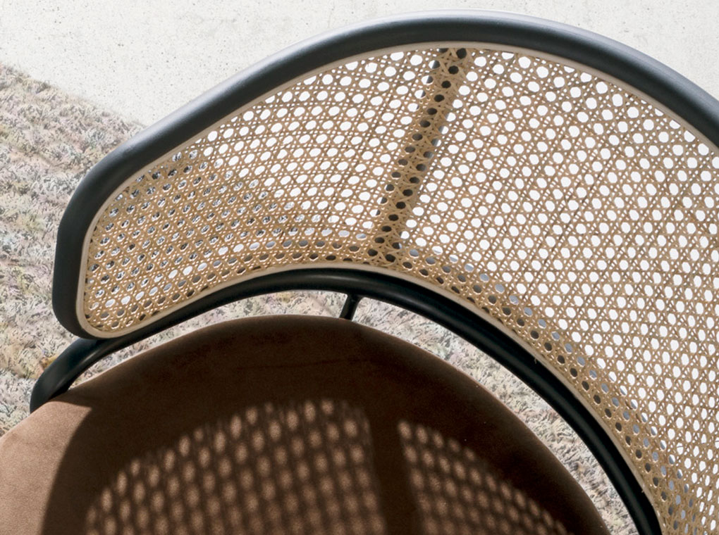 Rattan and brown velvet swivel chair