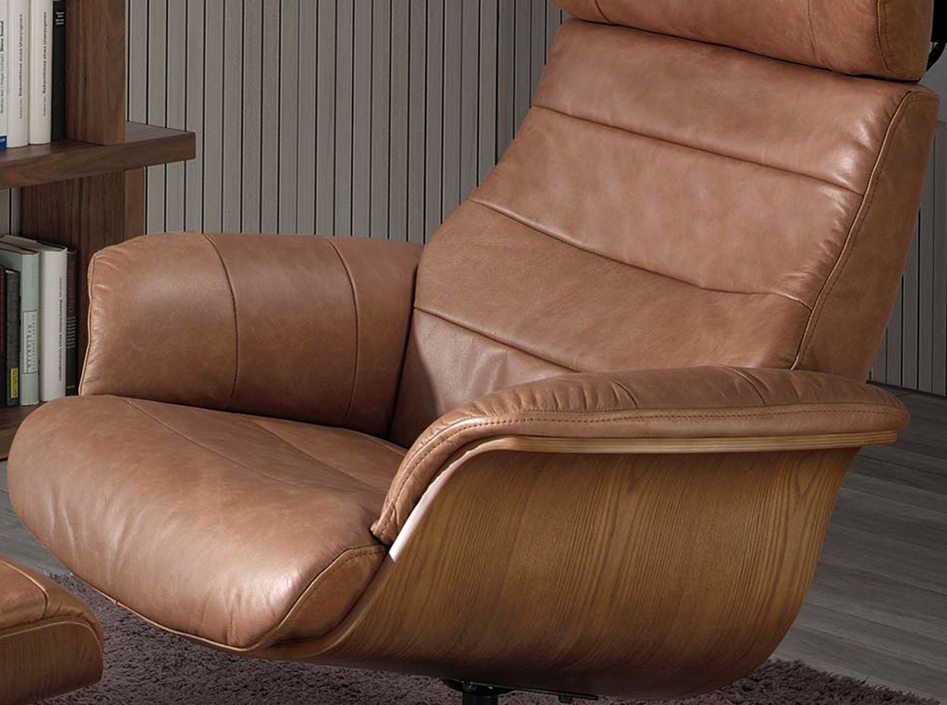 Reclining swivel armchair in brown leather