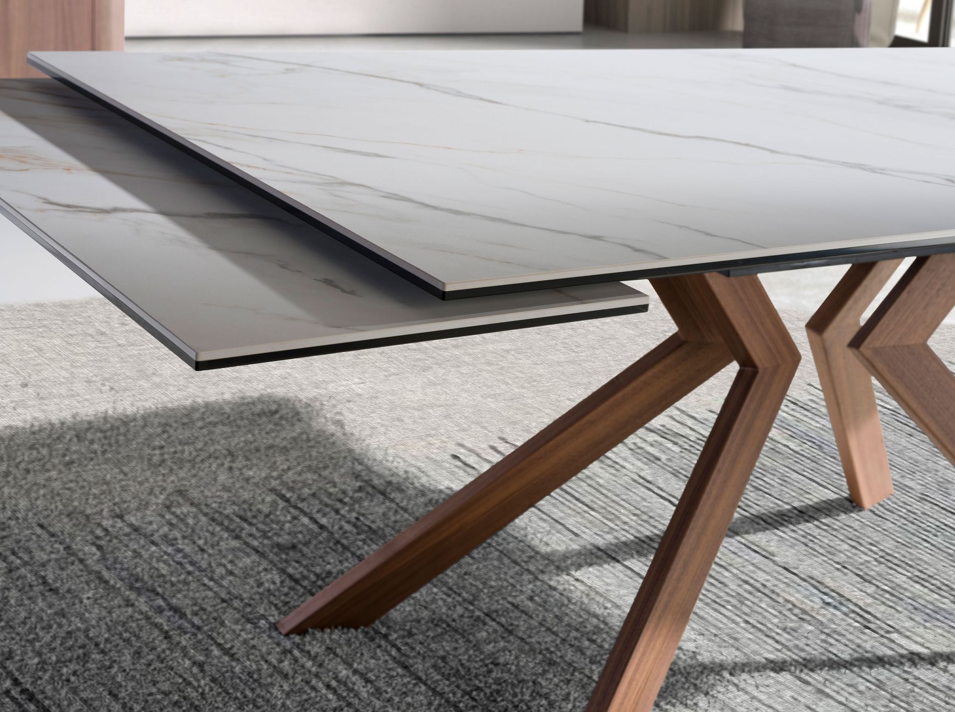 Rectangular extending dining table in porcelain marble and walnut effect steel