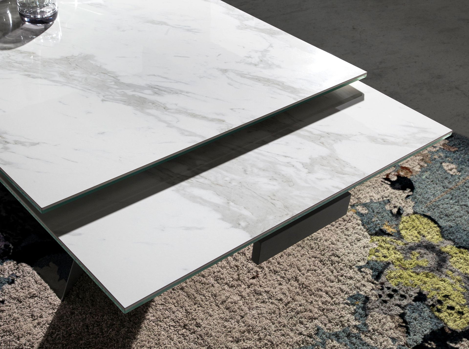 Rectangular porcelain marble and black steel extending dining table