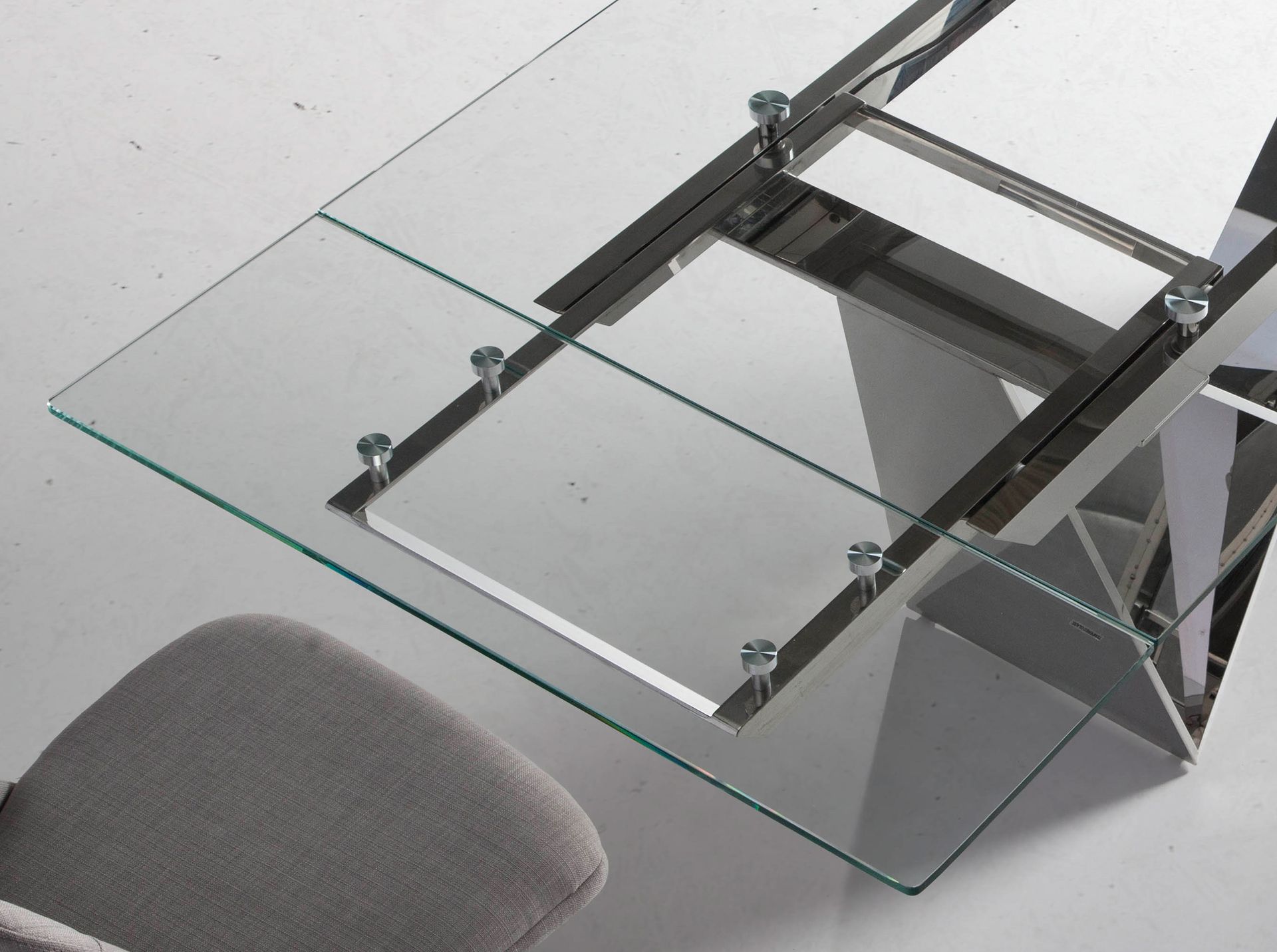 Rectangular tempered glass and chrome-plated steel extending dining table