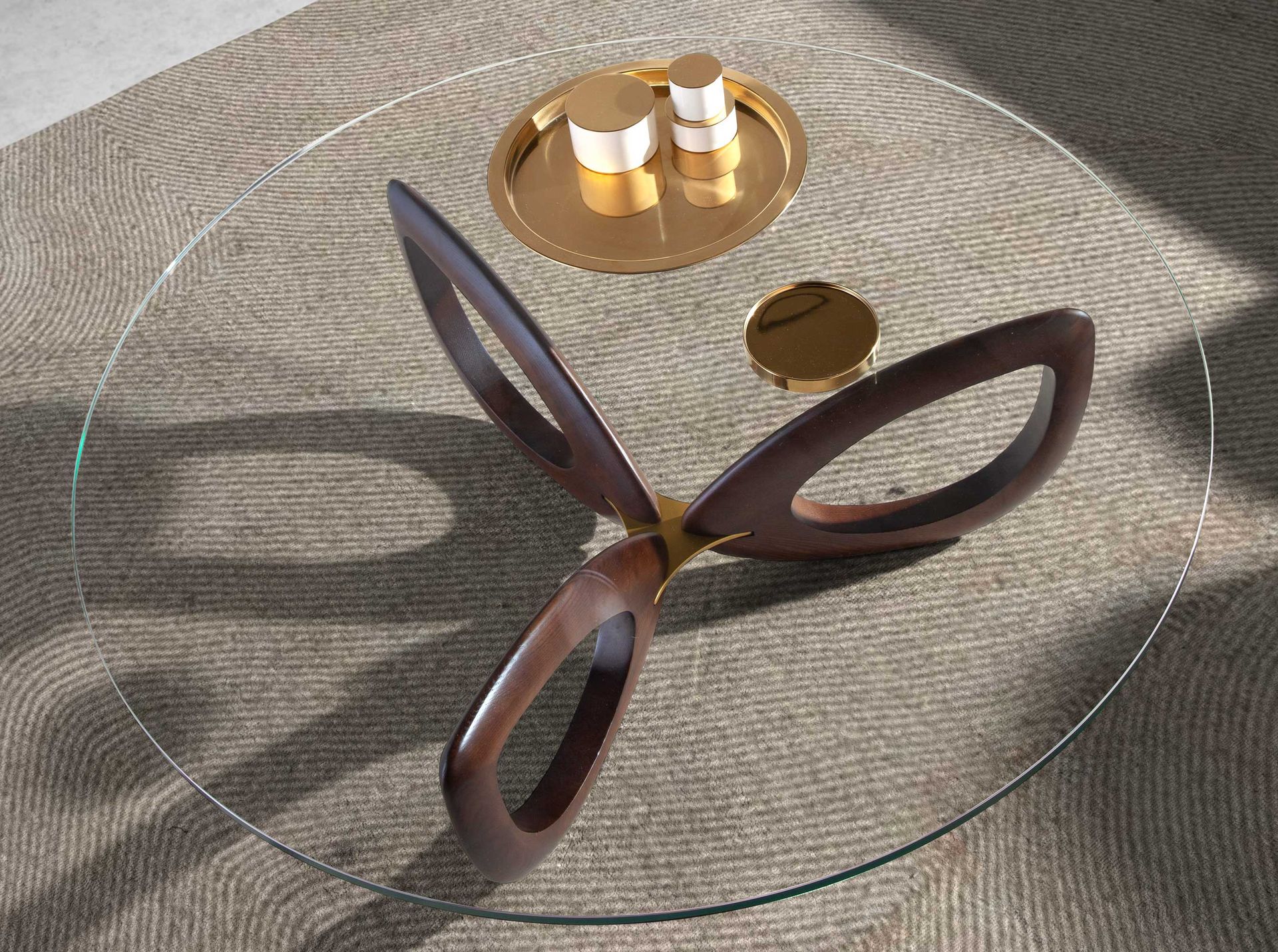 Round tempered glass and walnut coffee table