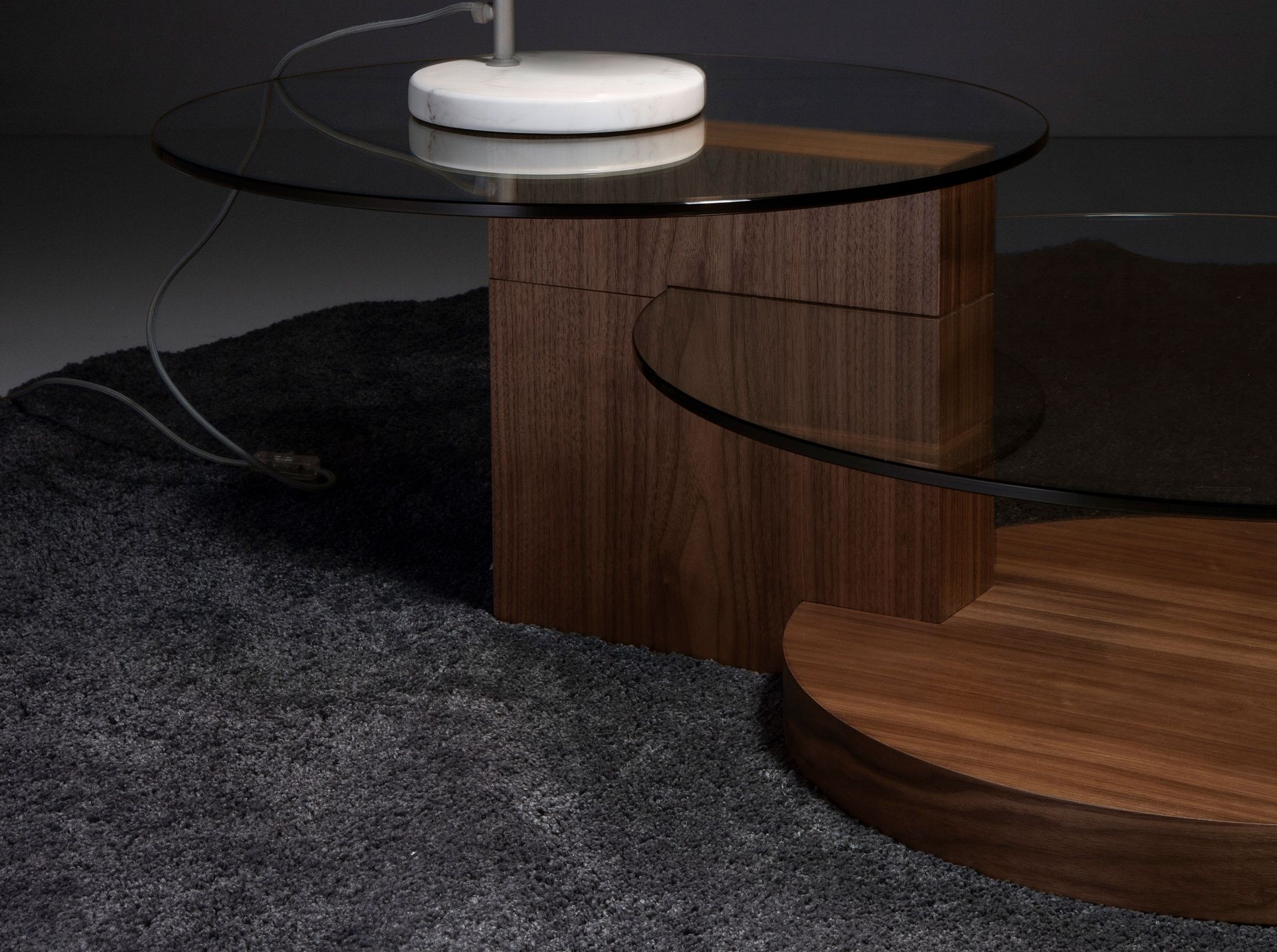 Round tempered glass and walnut coffee table