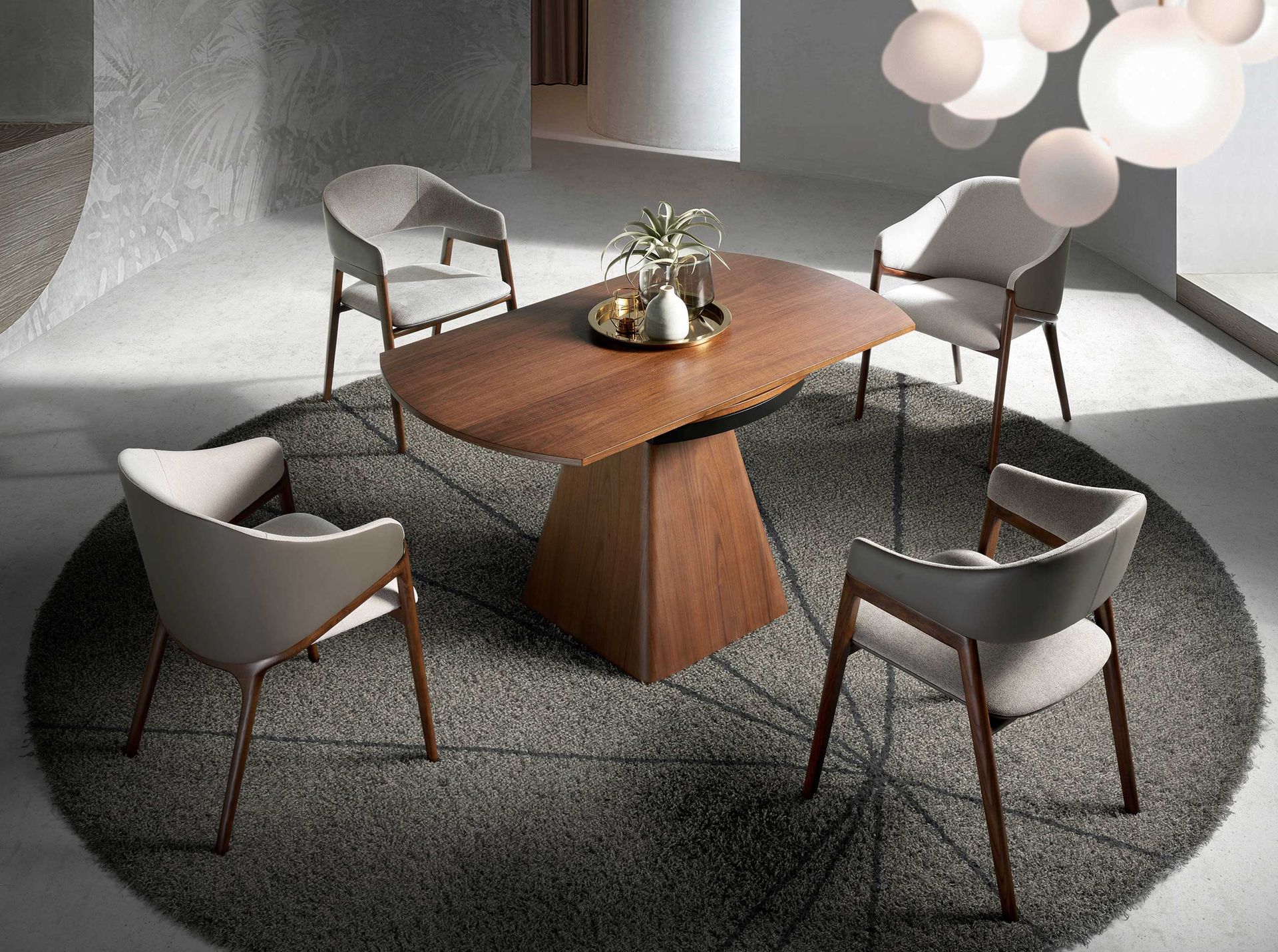 Round walnut extending dining table