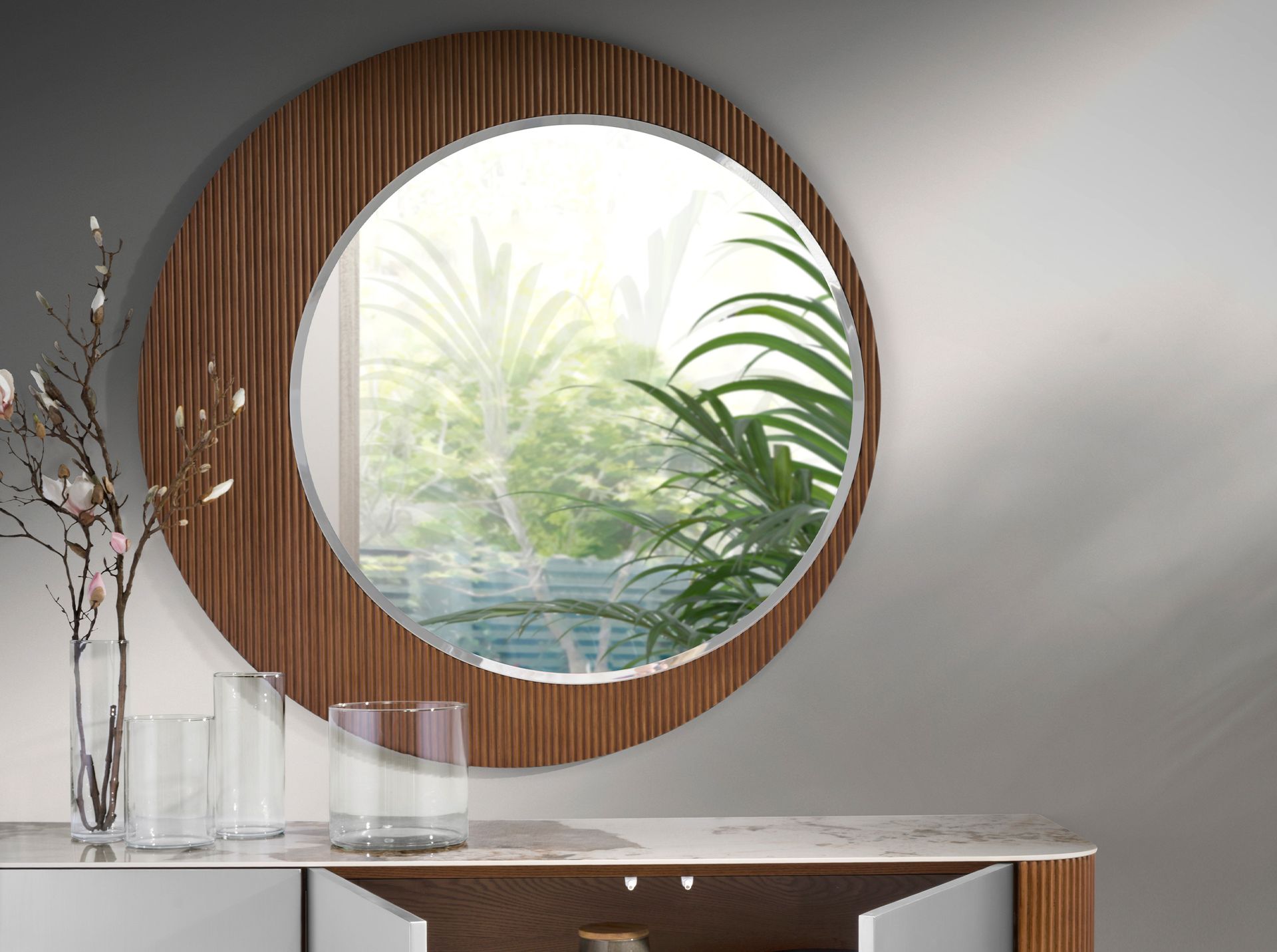 Round walnut wall mirror