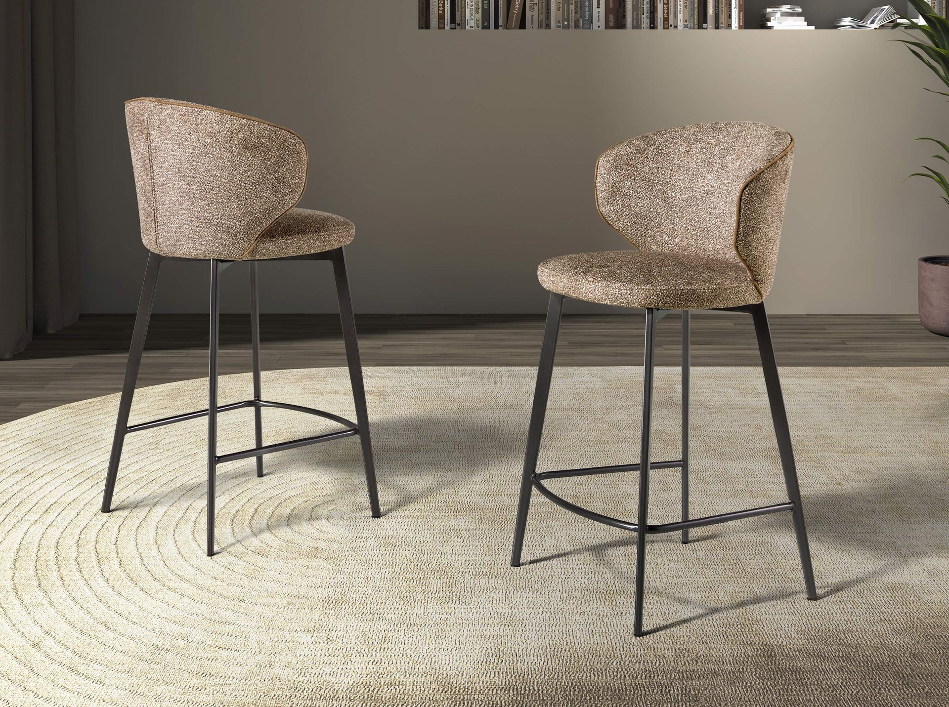 Stool upholstered in mottled brown fabric