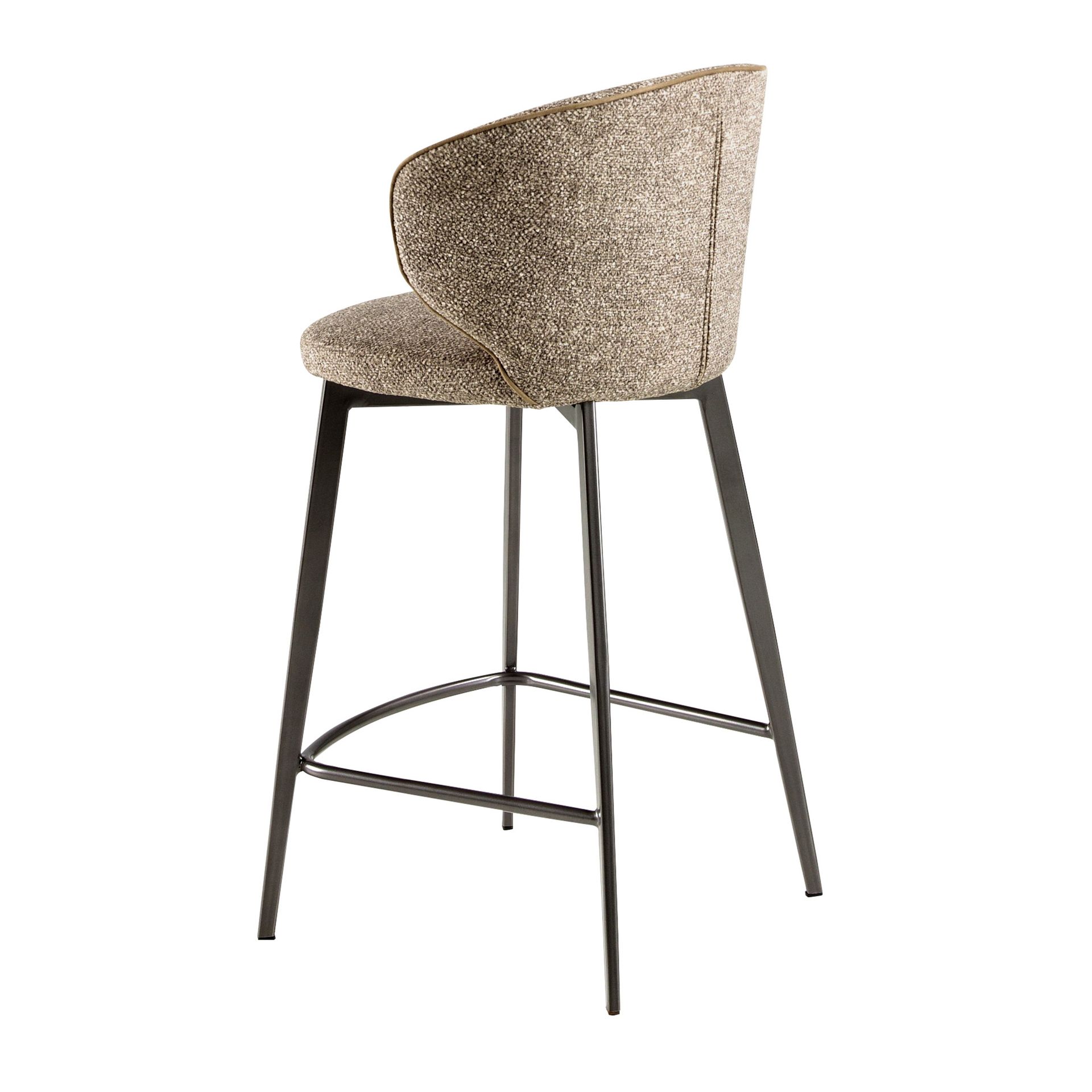 Stool upholstered in mottled brown fabric