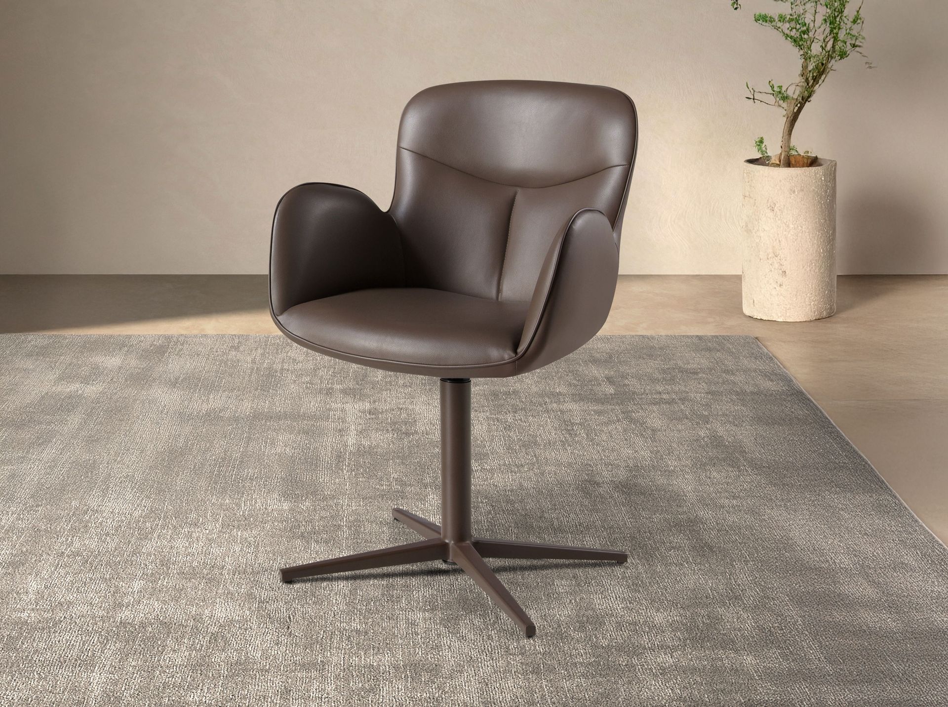 Swivel chair in chocolate brown leatherette