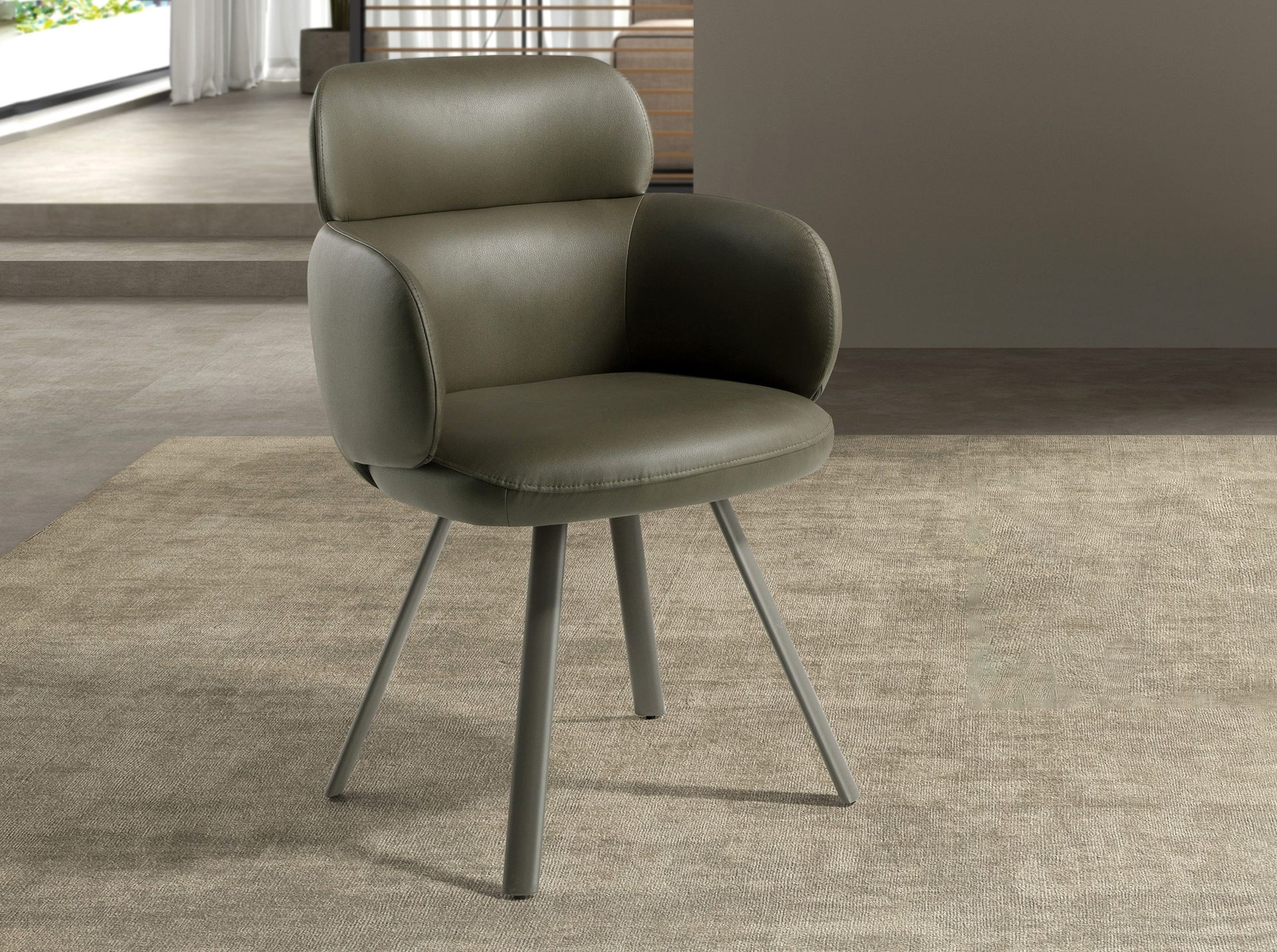 Swivel chair in olive green leatherette
