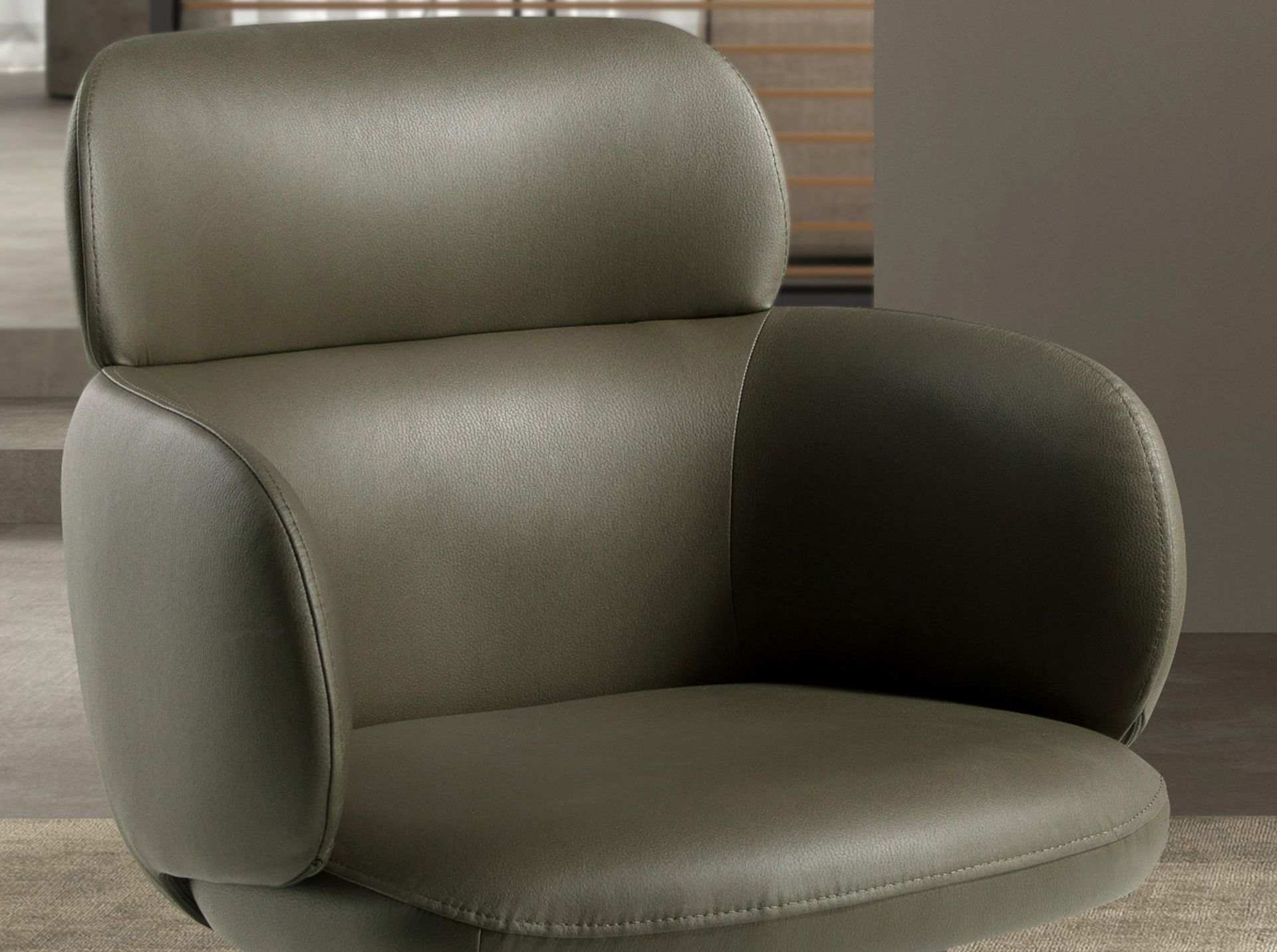 Swivel chair in olive green leatherette