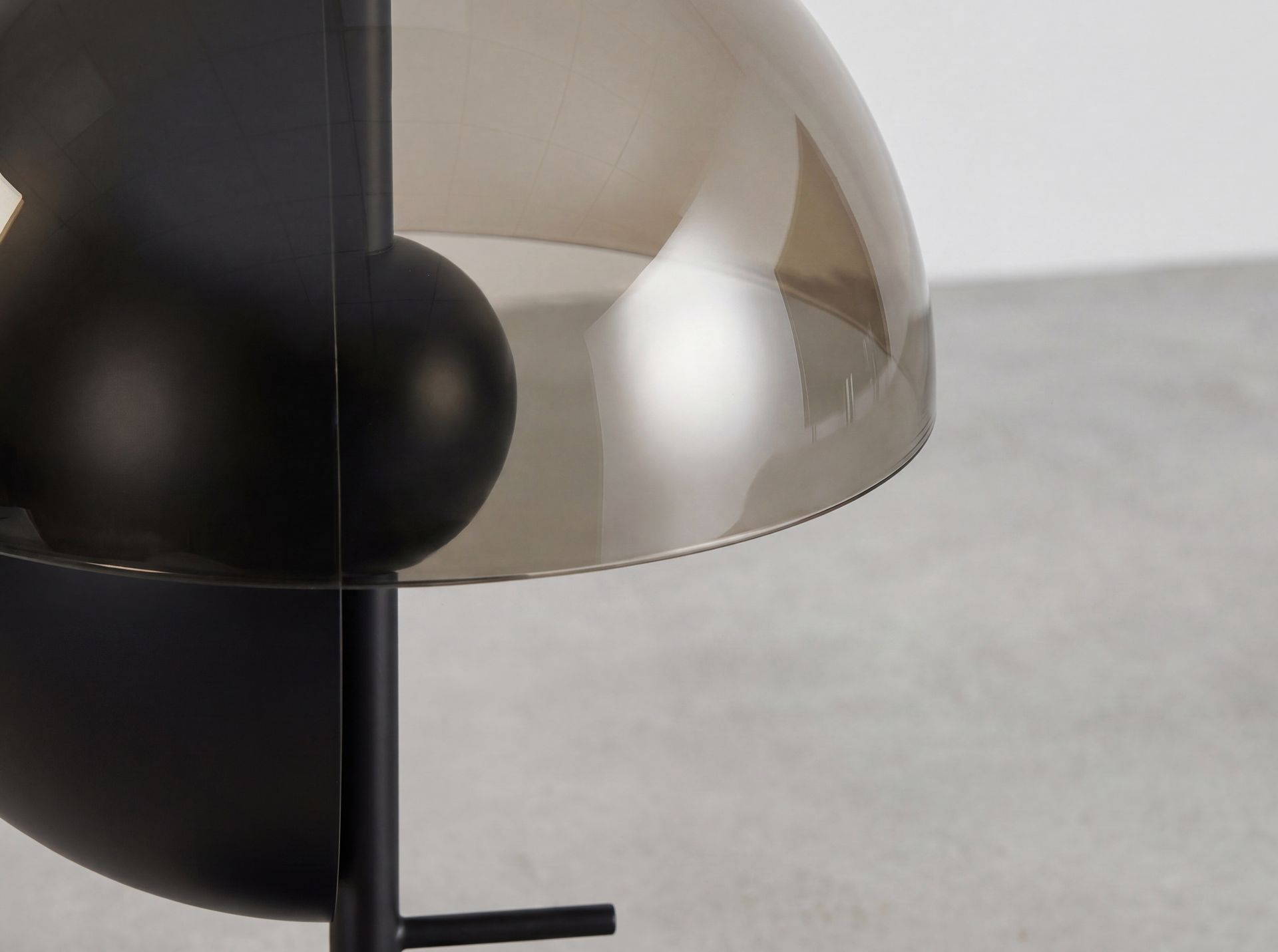 Table lamp in amber smoked glass and black and white steel with black steel base