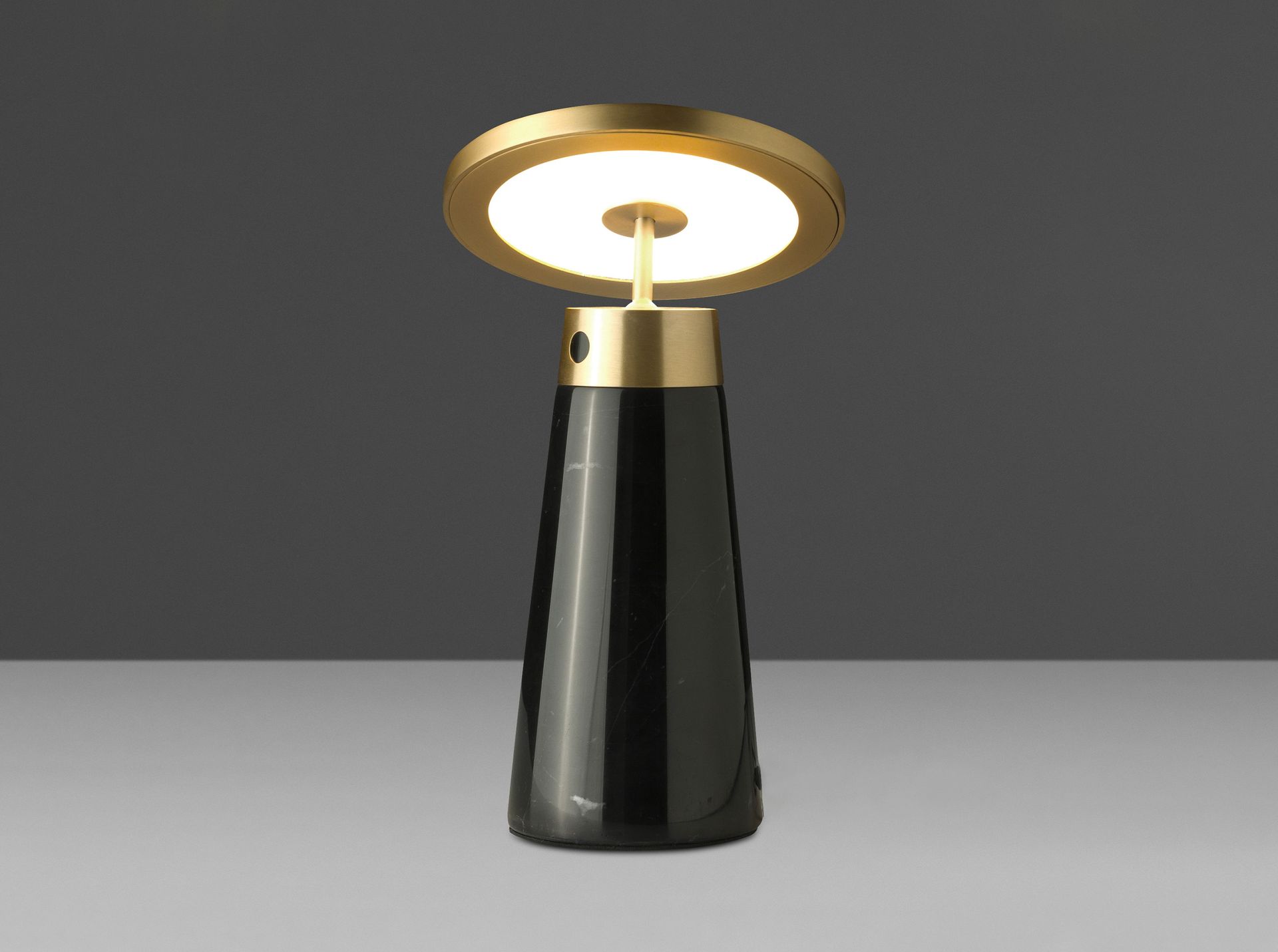 Table lamp in black marble and golden steel