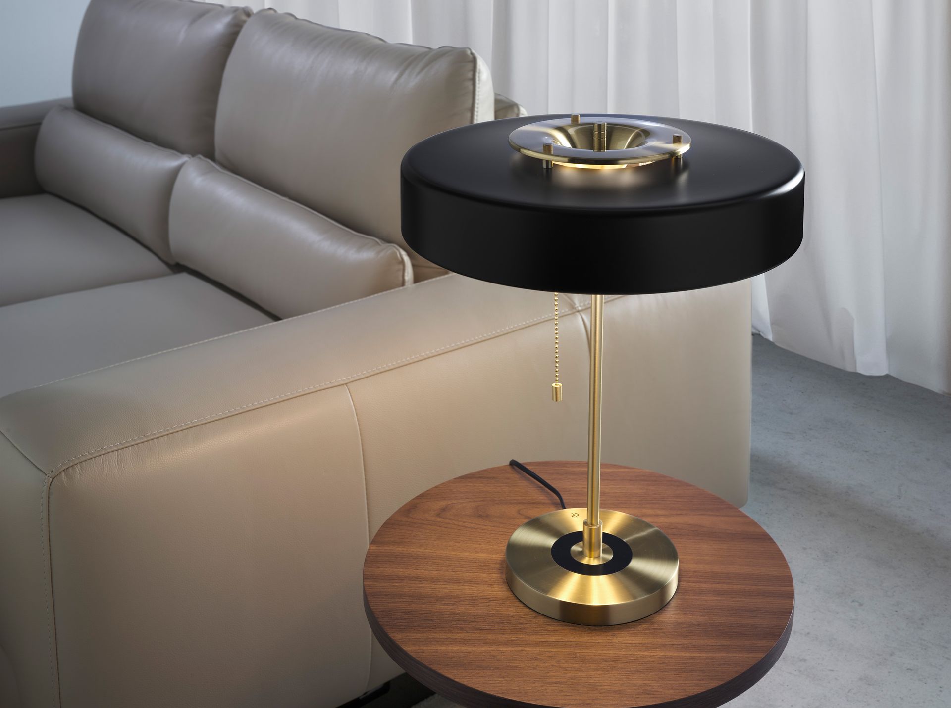 Table lamp in gold aluminium and black aluminium