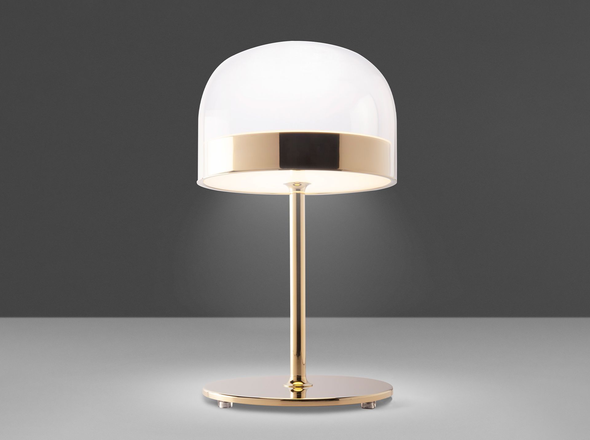 Table lamp in steel and transparent glass