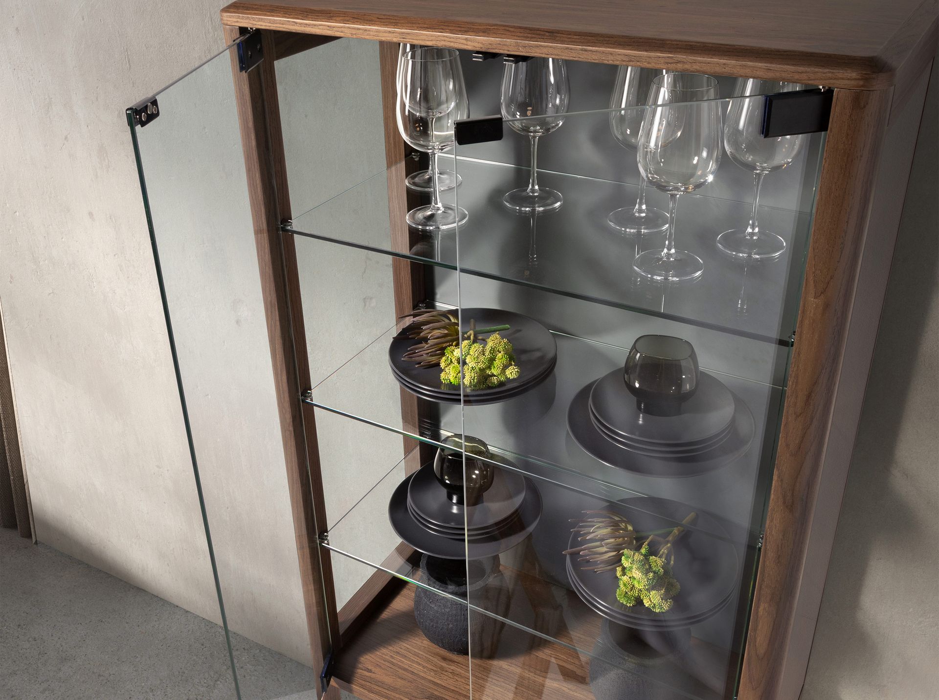 Tall sideboard in tempered glass and walnut with interior lighting