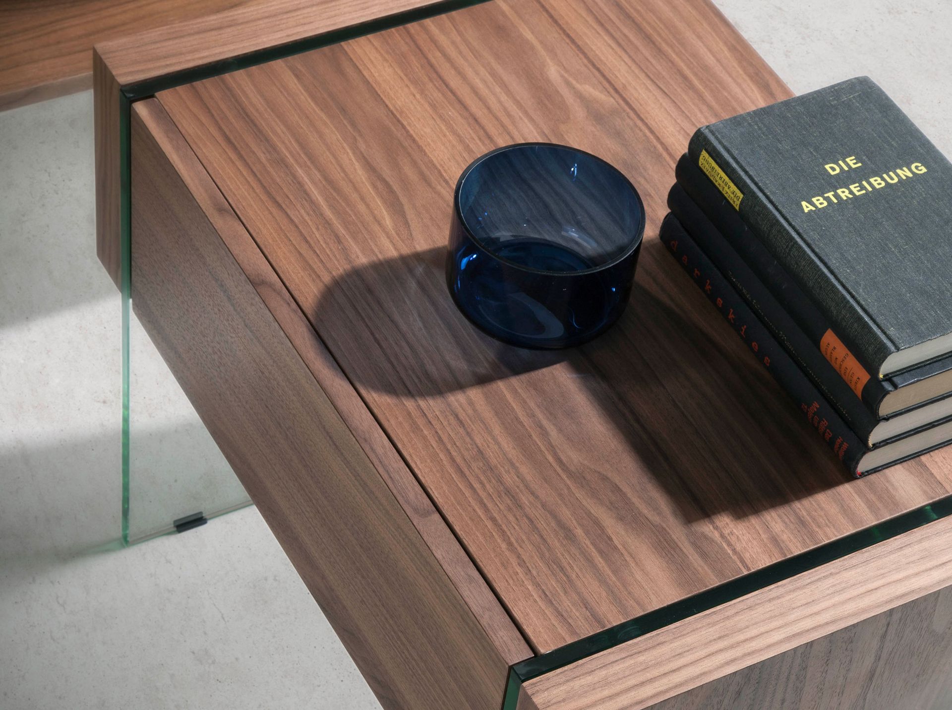 Walnut and tempered glass bedside cabinet
