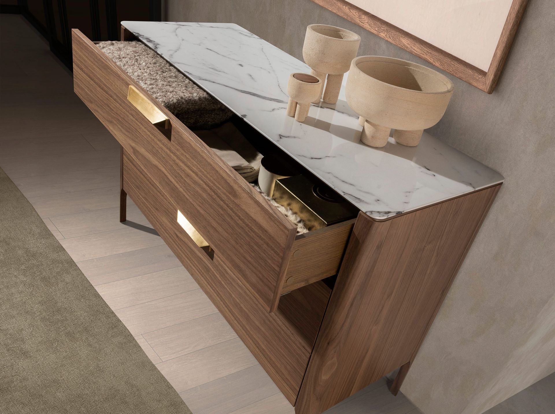 Walnut chest of drawers with marble-effect glass top