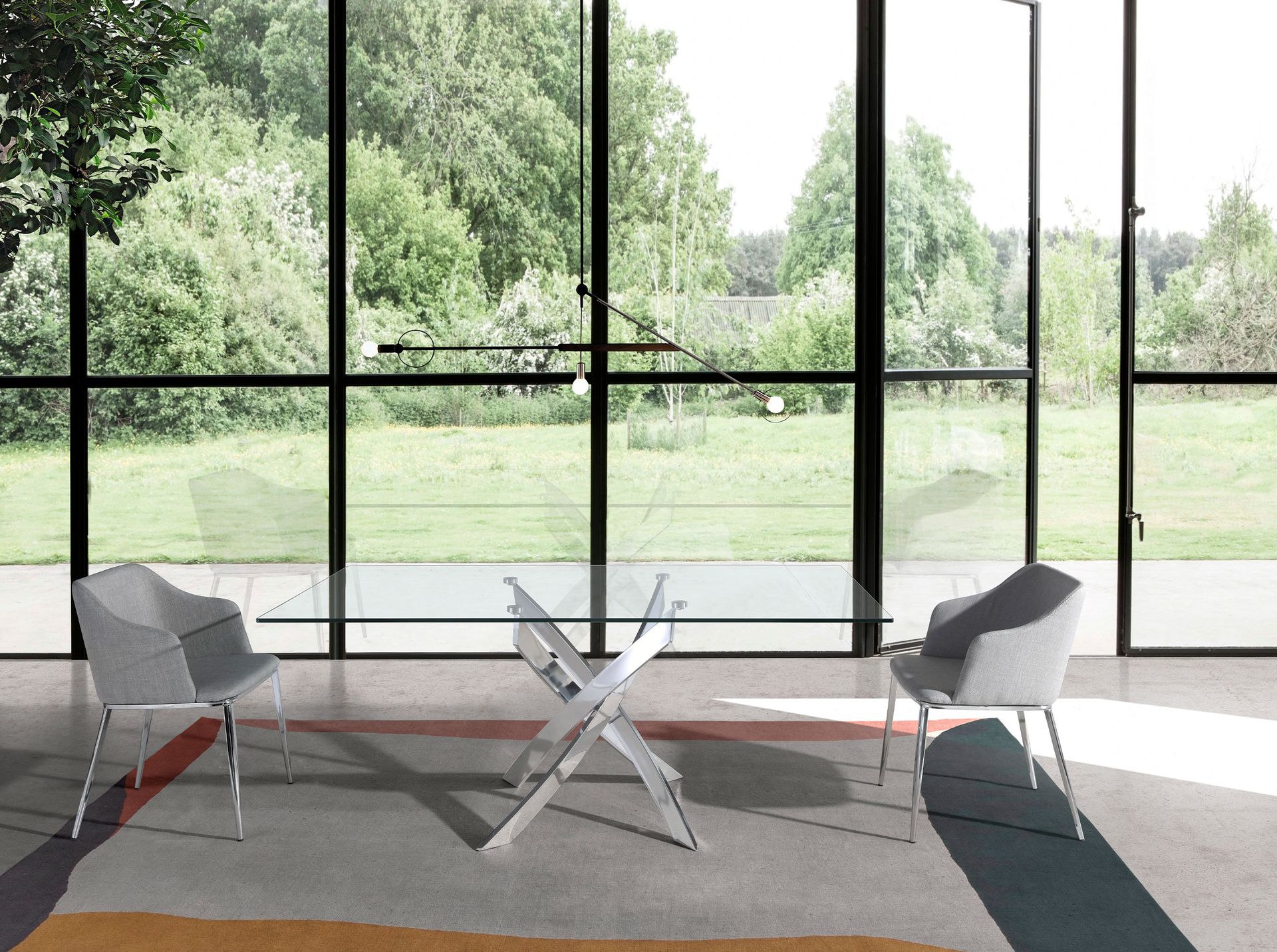 Rectangular tempered glass and chrome-plated steel dining table